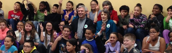 Surrounded by energetic students are Hope Tinker, Paul Tinkerhess, and Mary Beth. Thanks, principal Fee, and everybody!